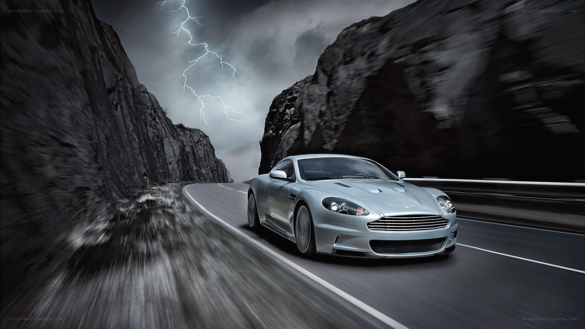 silver car on mountain road