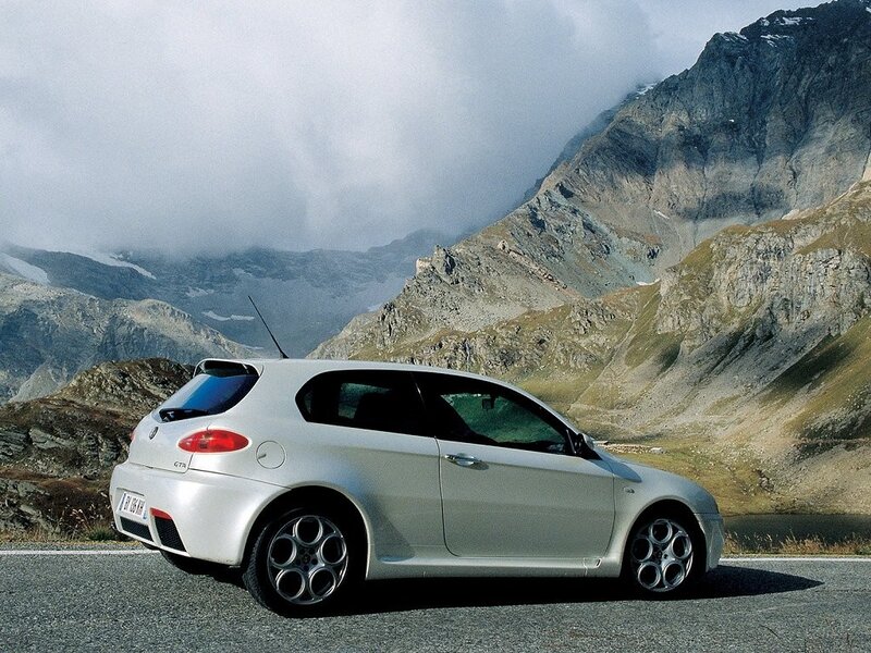 Silver Car on Mountain Road — White