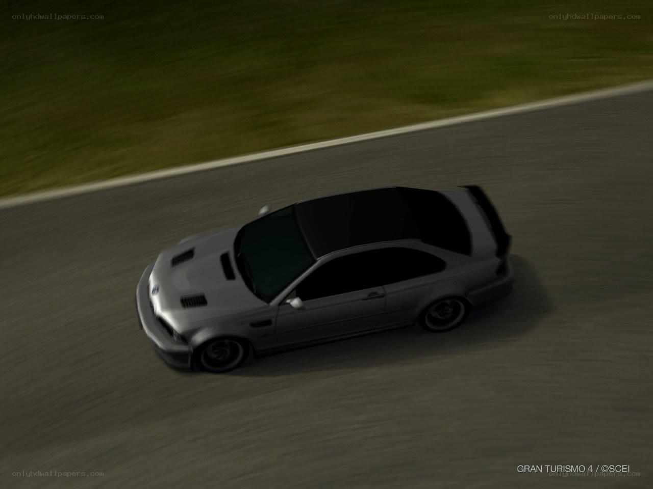 silver car on racetrack