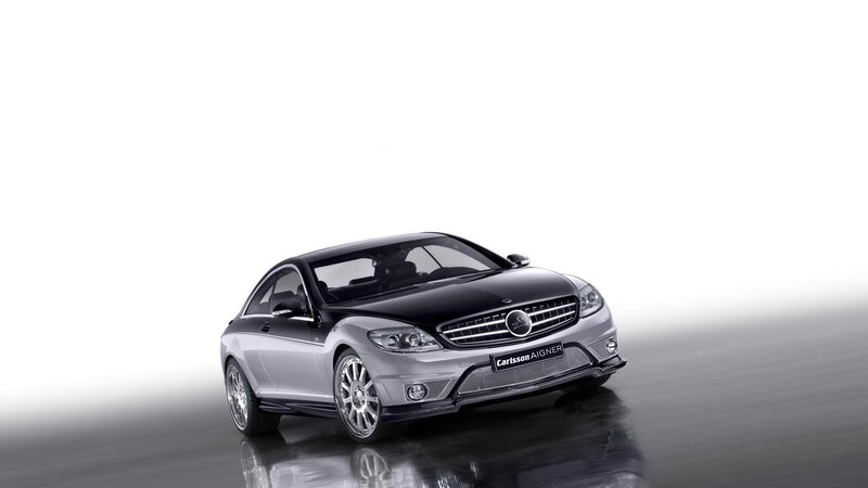 silver car on reflective surface