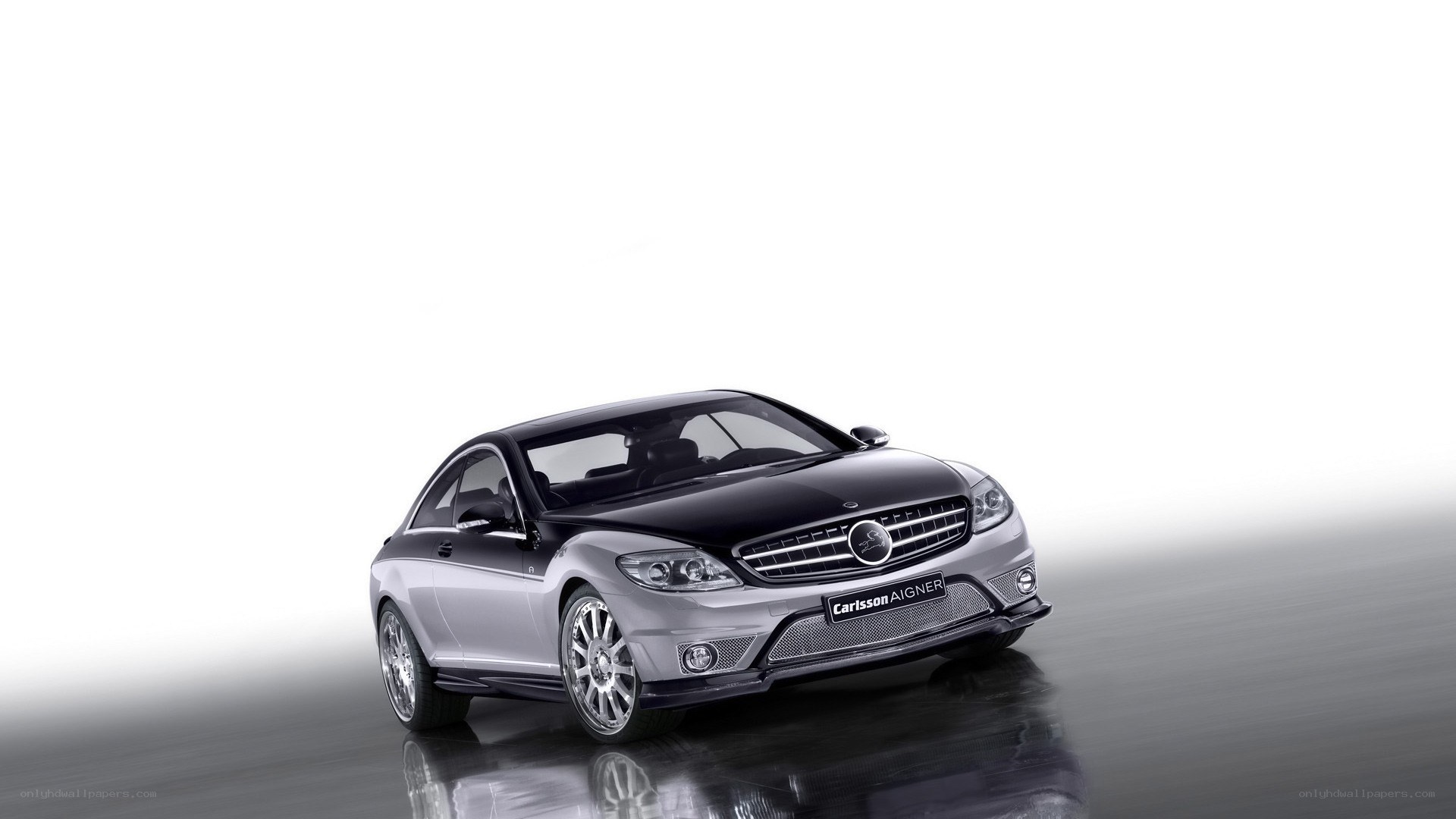 silver car on reflective surface