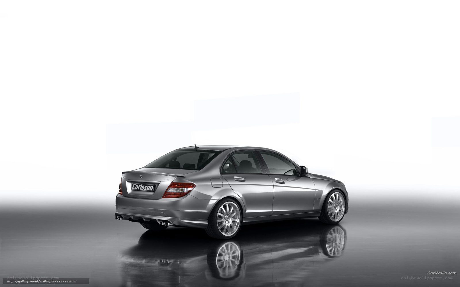 silver car on reflective surface