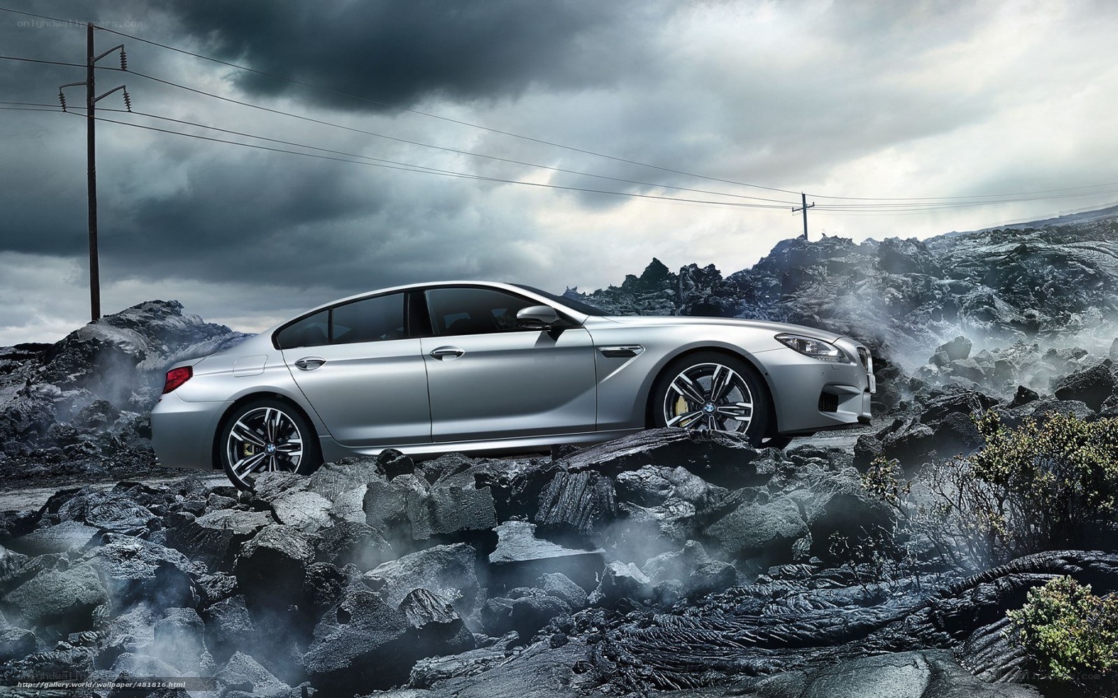 Silver car on rocky terrain