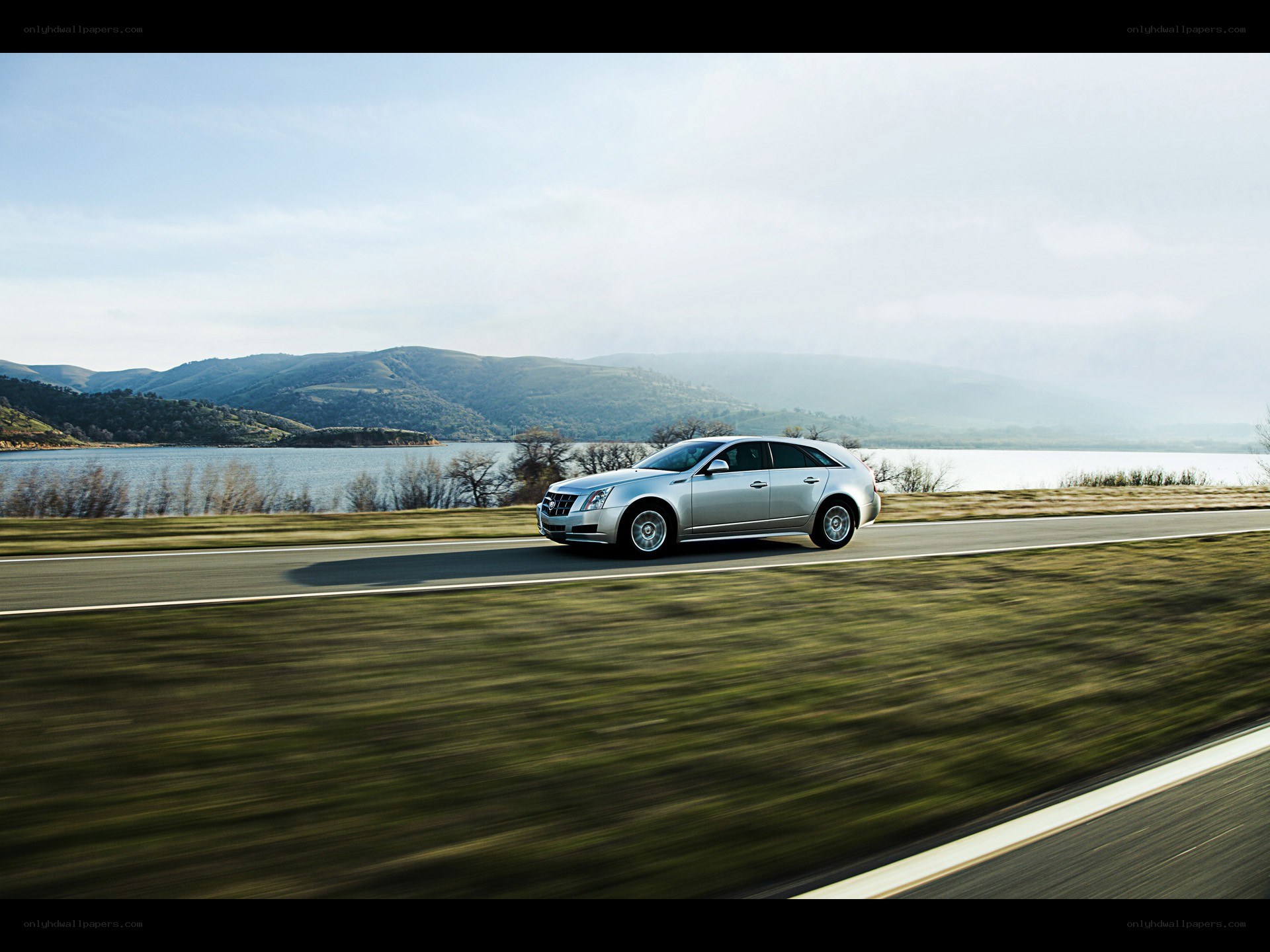 Silver car on scenic road