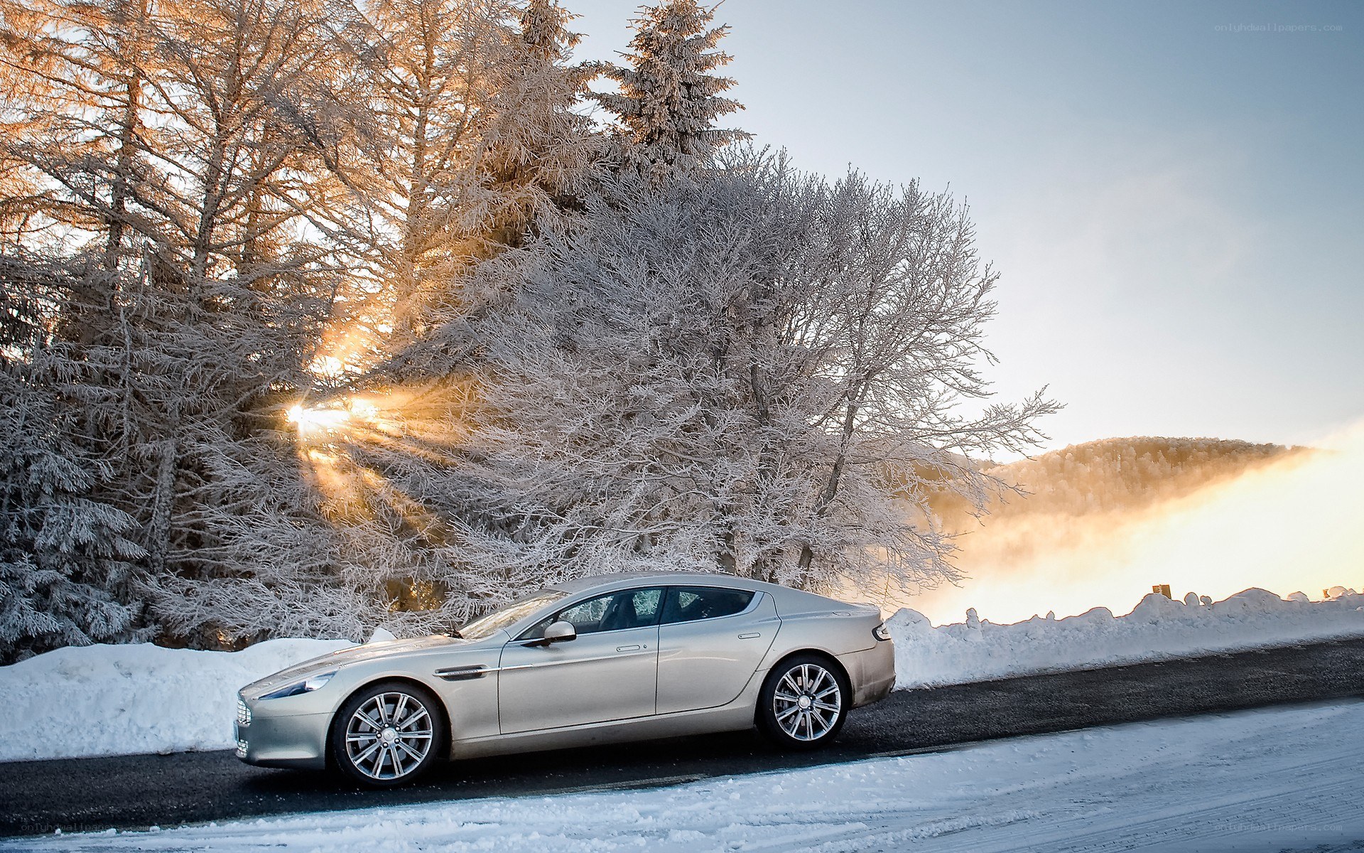 Silver car on snowy road