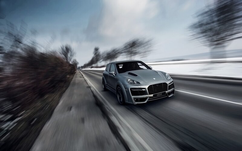 silver car on snowy road