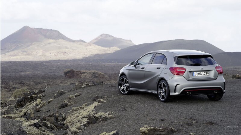 Silver Car on Volcanic Terrain — Gray