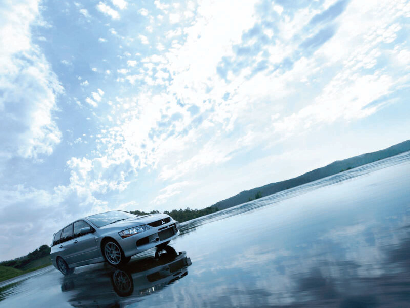 Silver car on wet road
