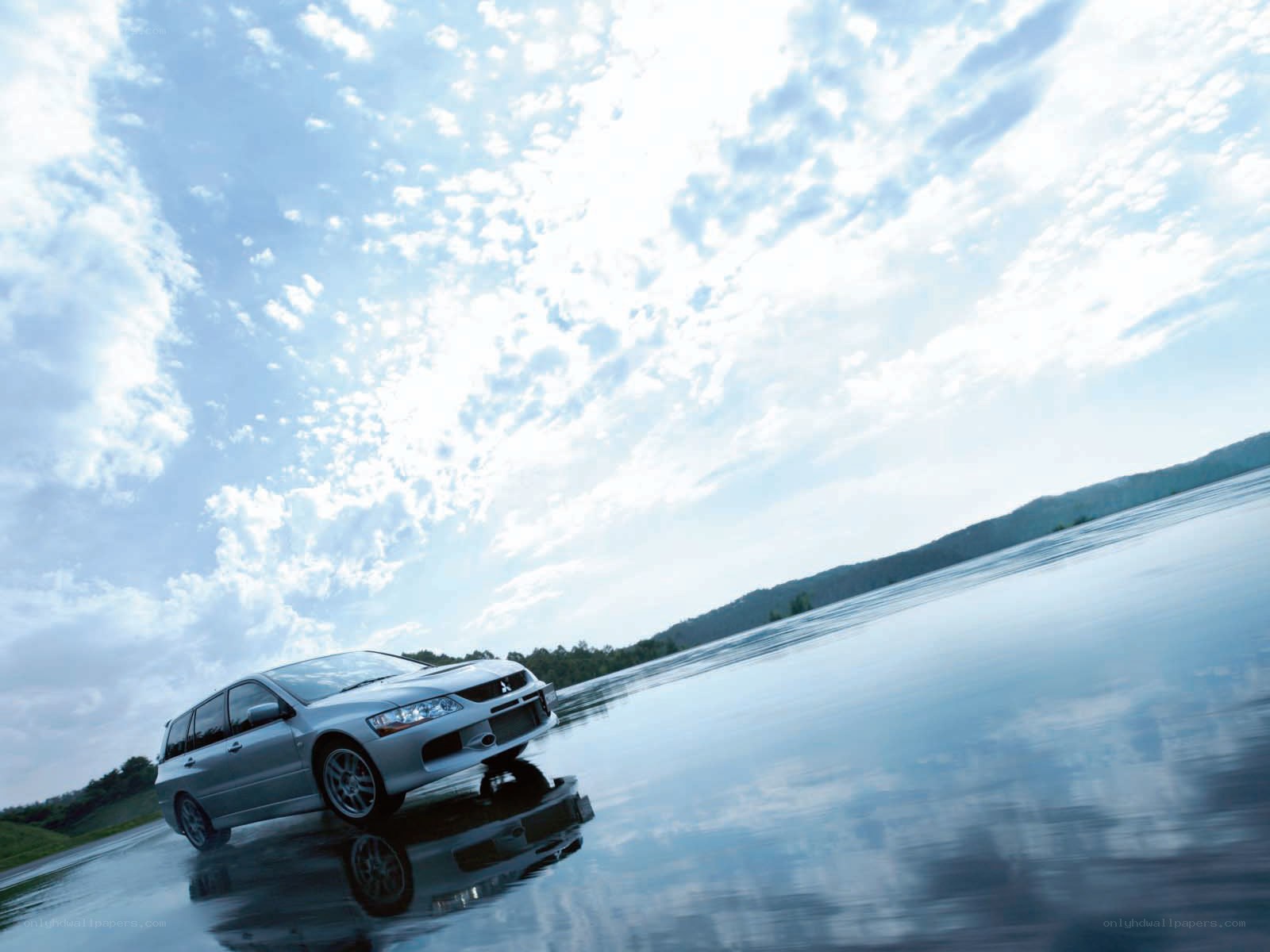 Silver car on wet road