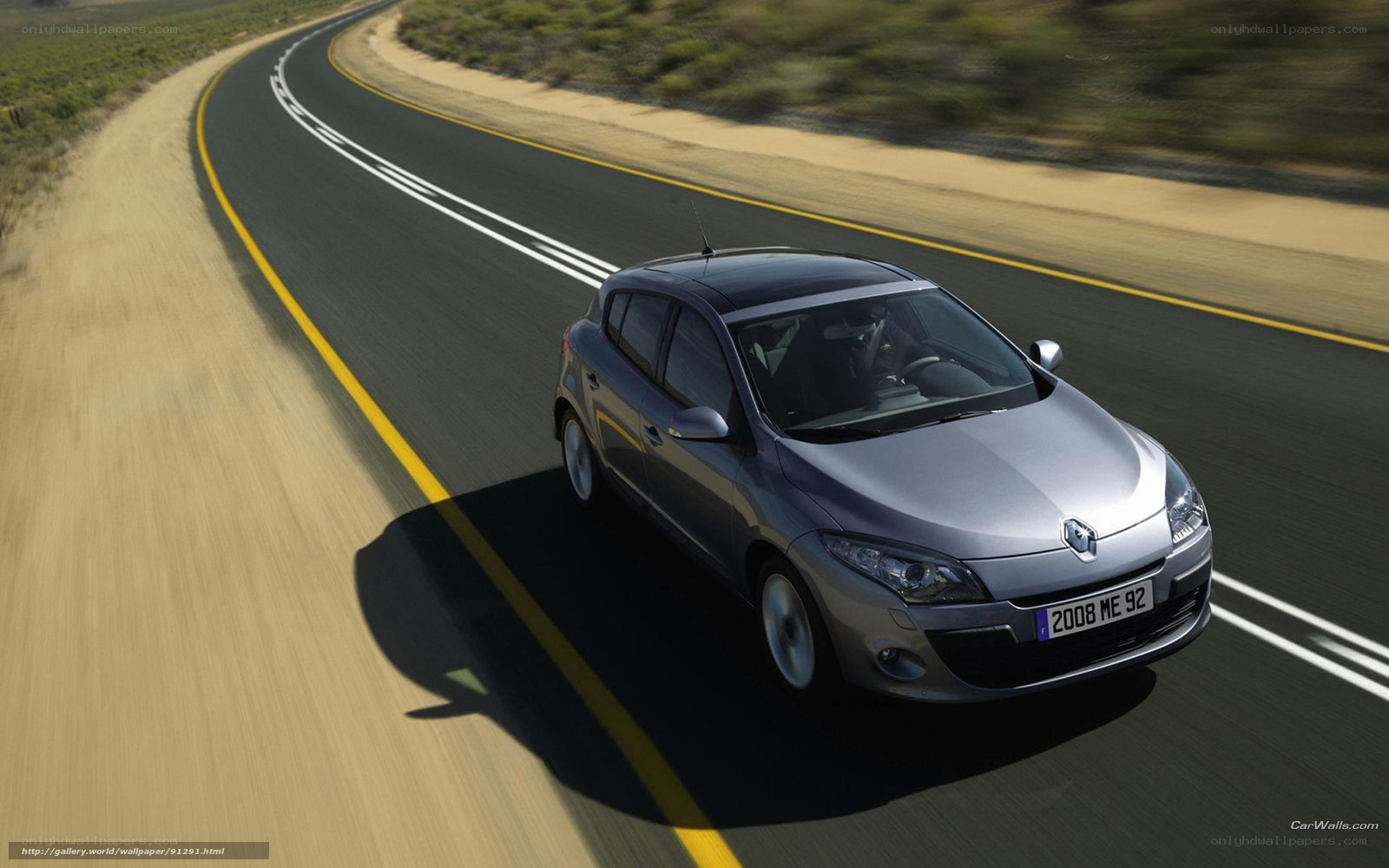 silver car on winding road