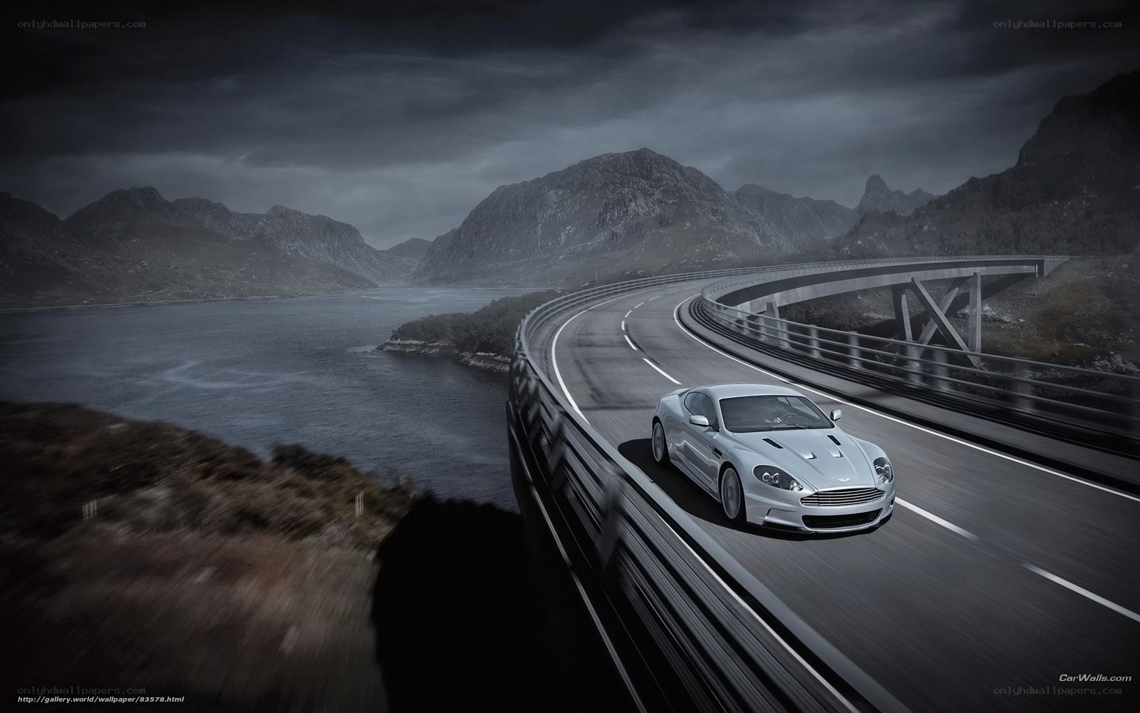 silver car on winding road