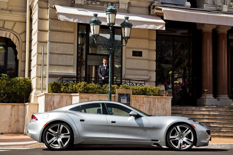 Silver car outside luxury hotel