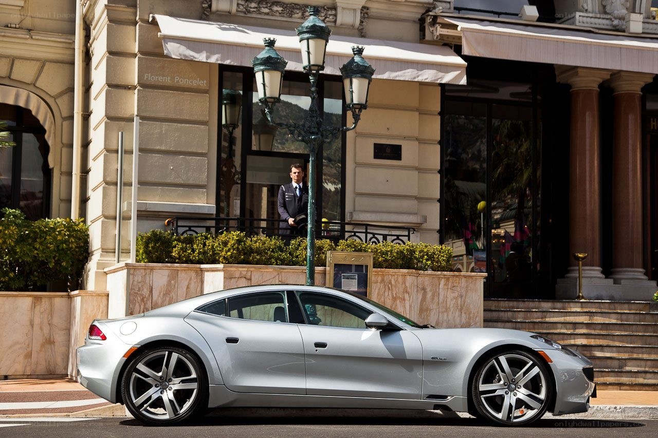 Silver car outside luxury hotel