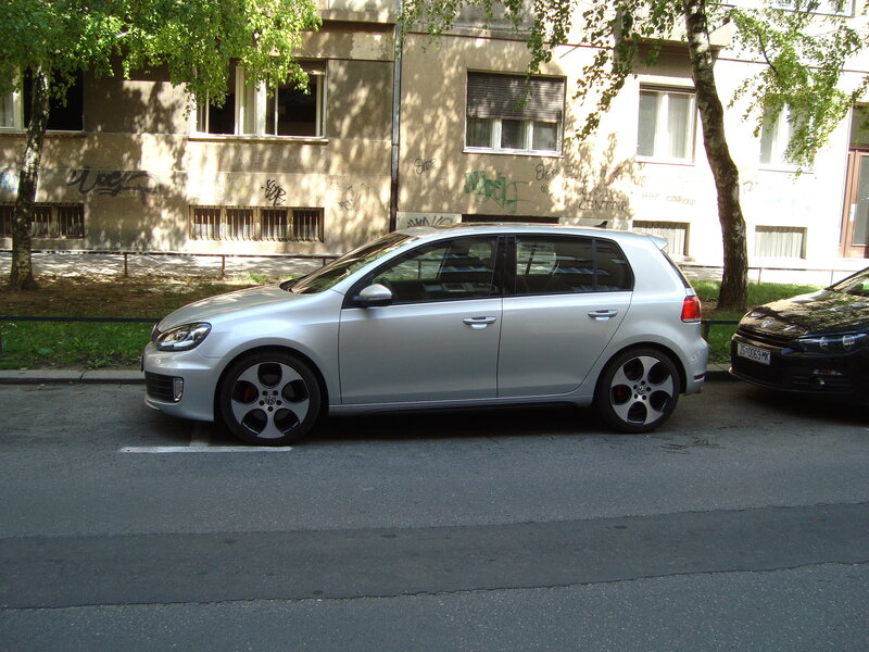 Silver car parked on street