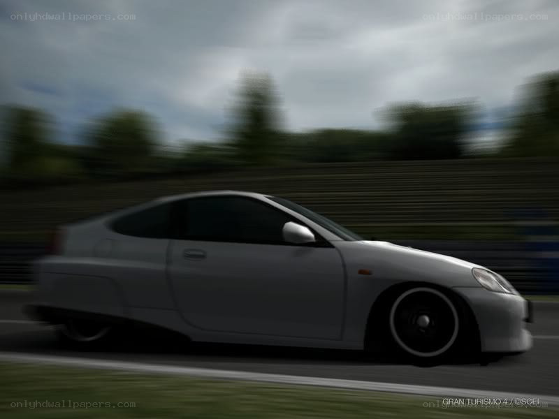 silver car racing on track