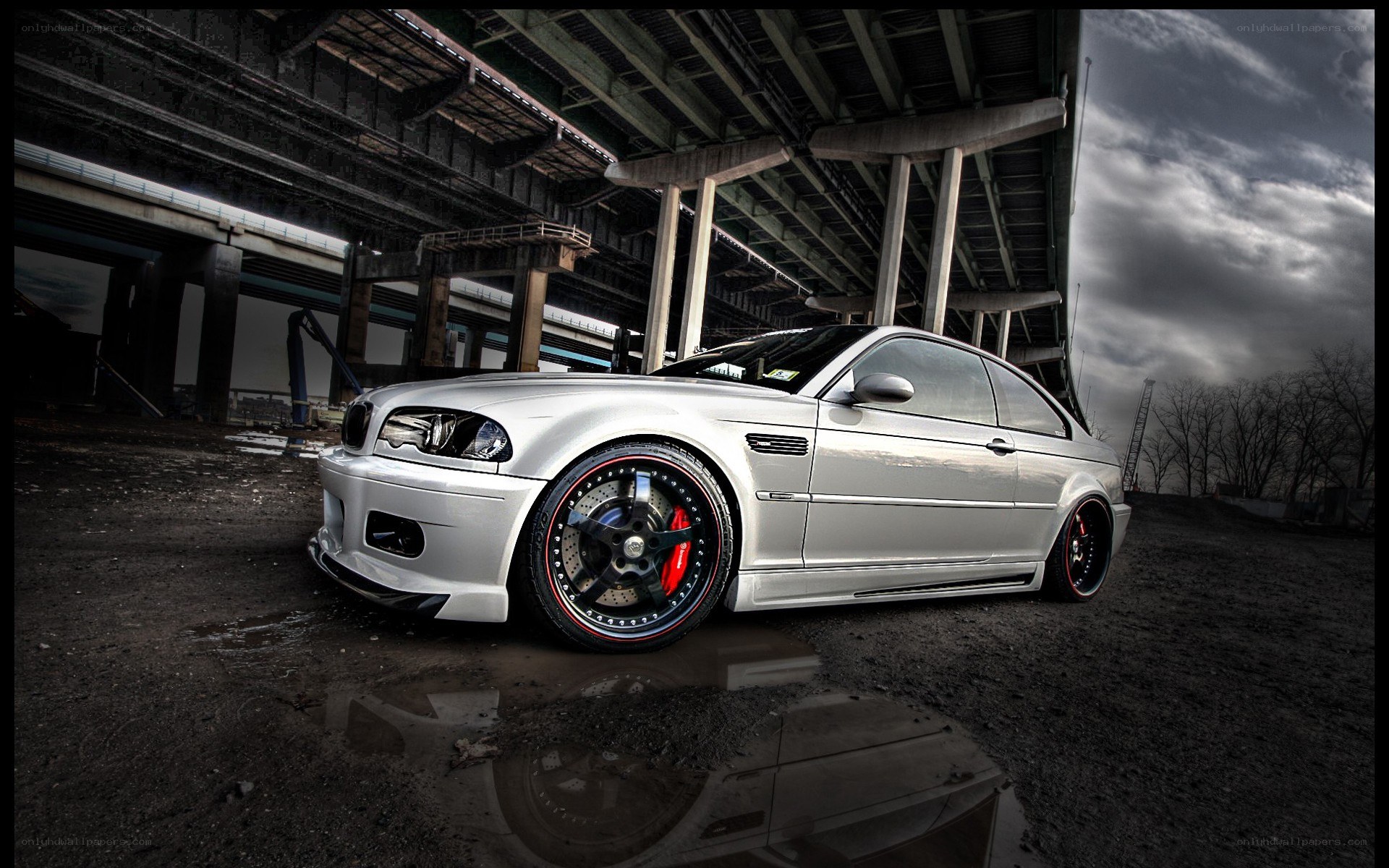 silver car under highway