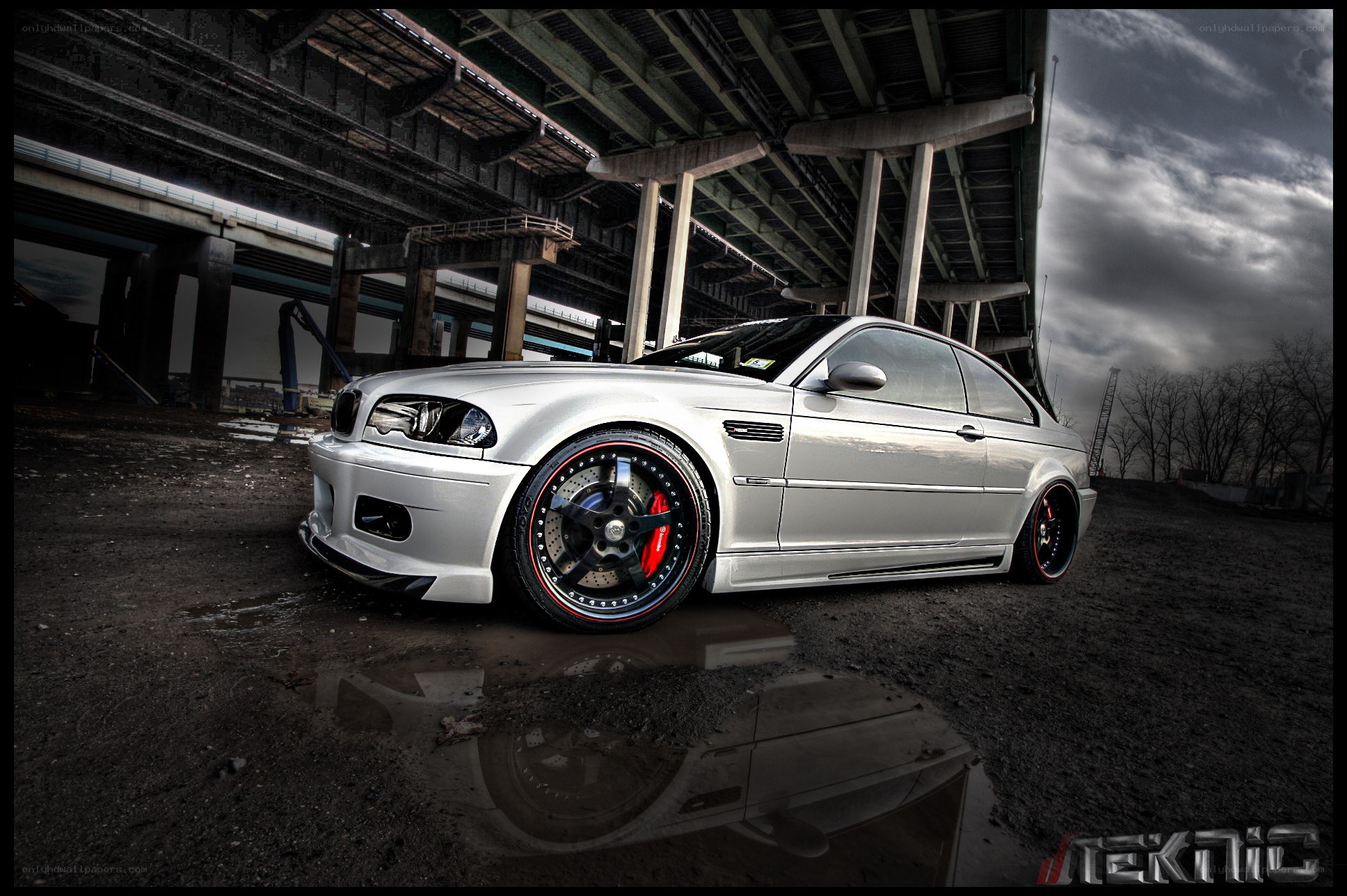 silver car under highway