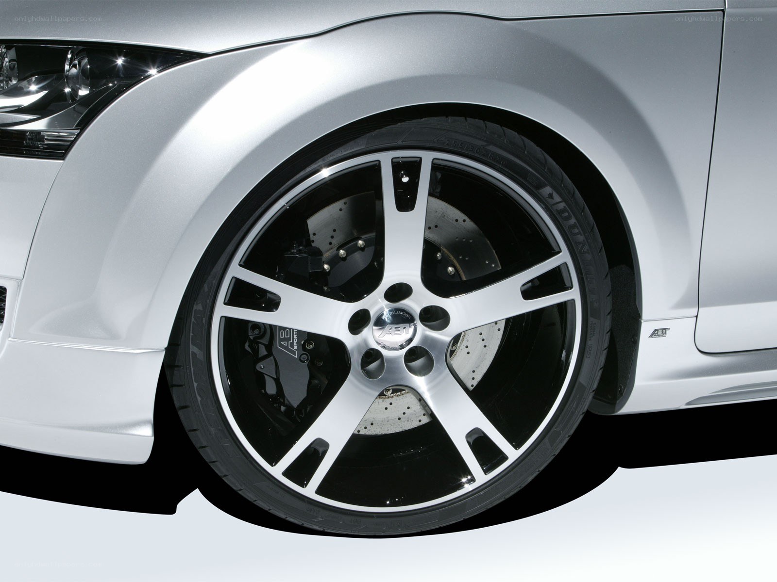 silver car wheel close-up