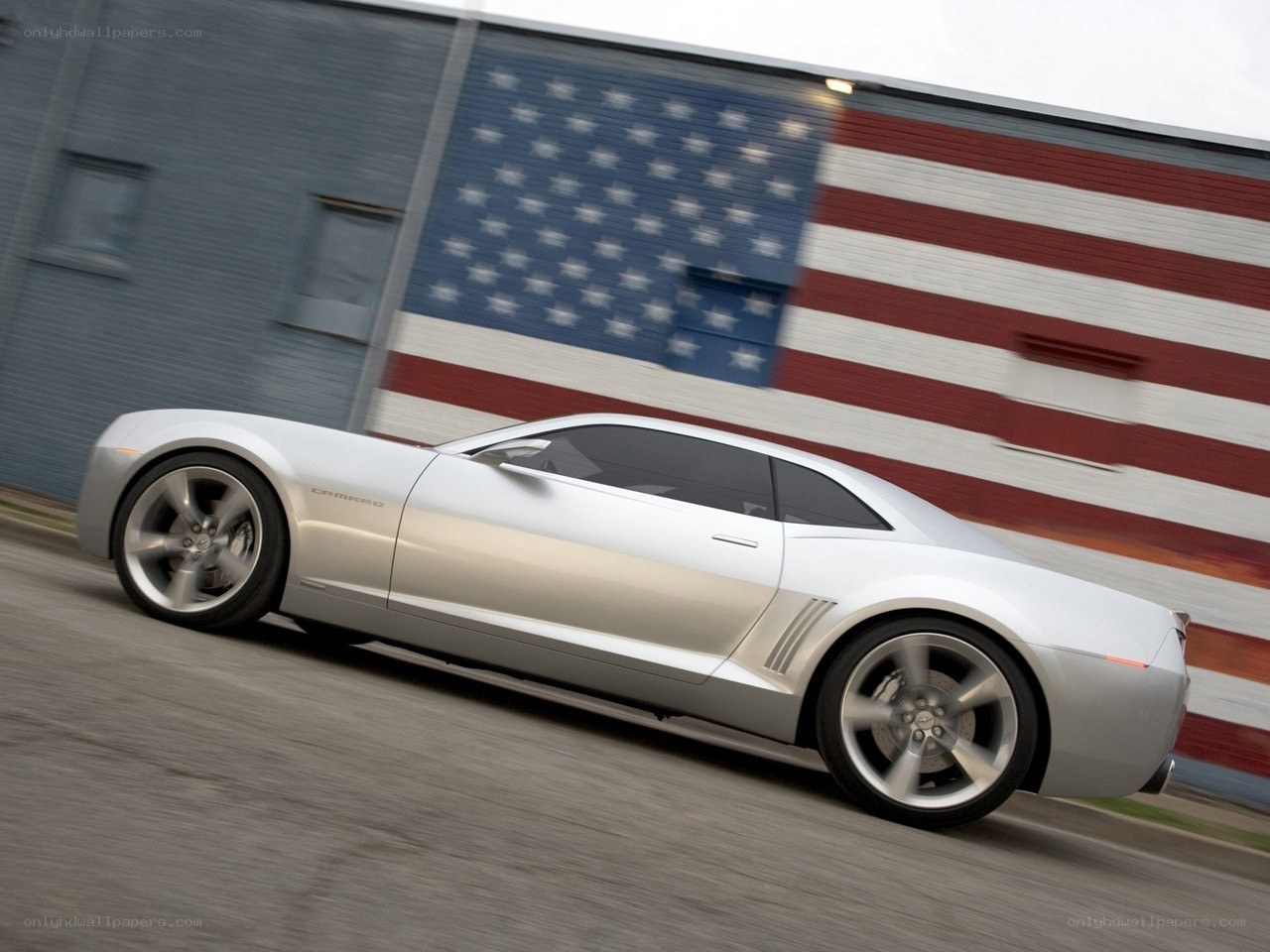 Silver car with American flag