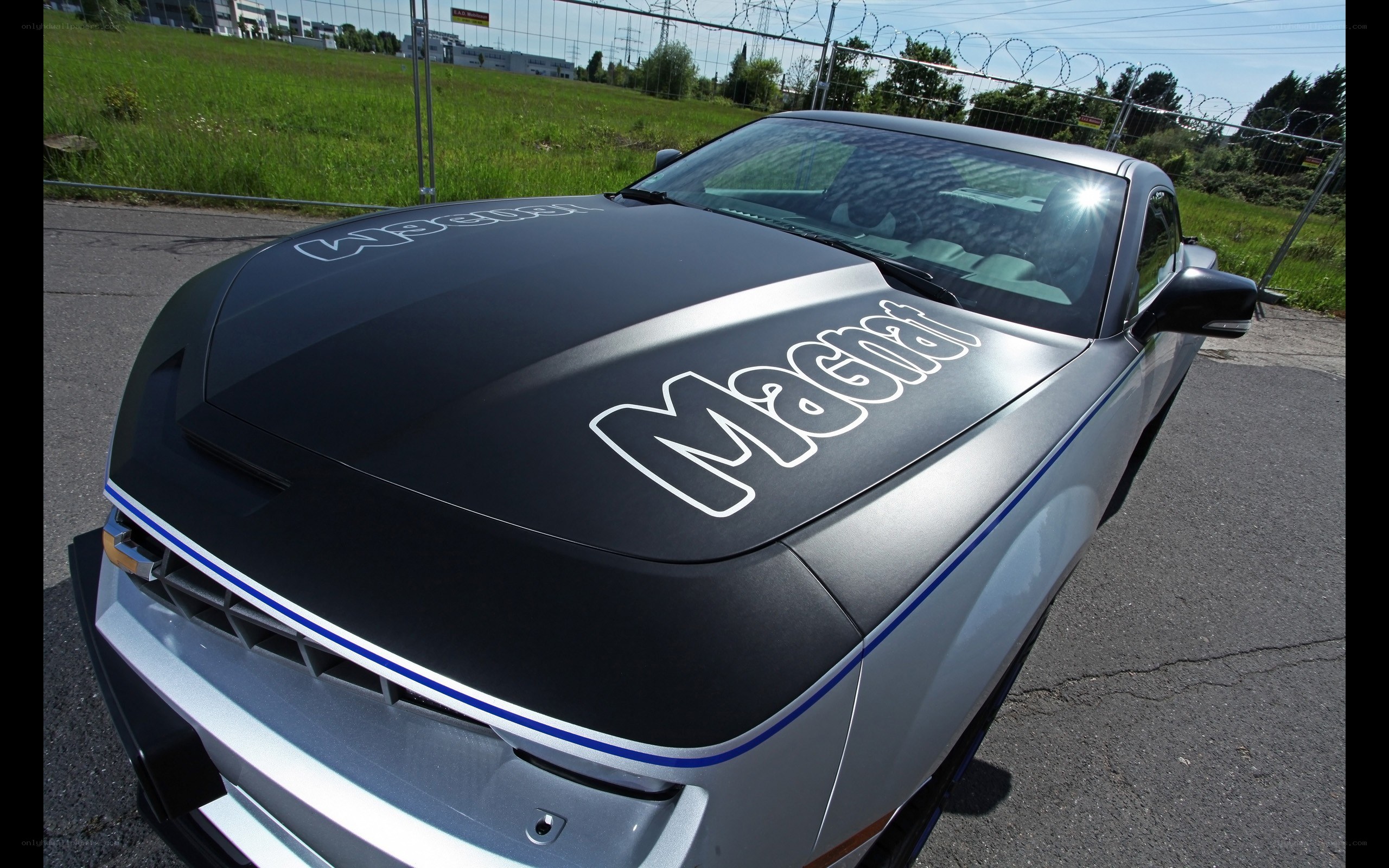 Silver car with black hood