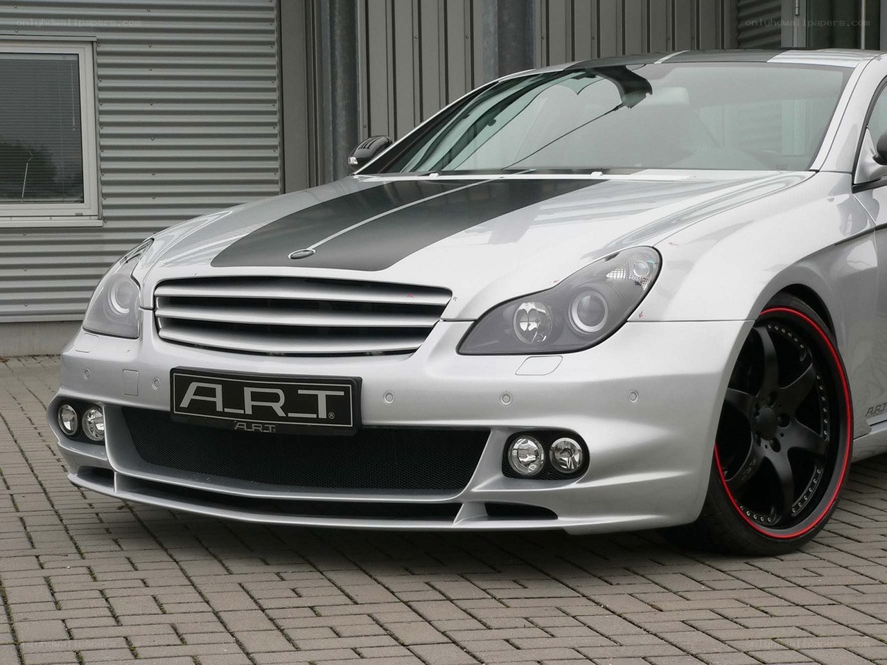 silver car with black stripes