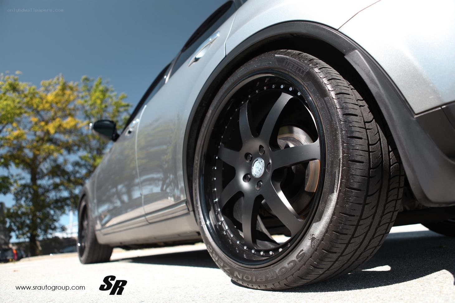 silver car with black wheels