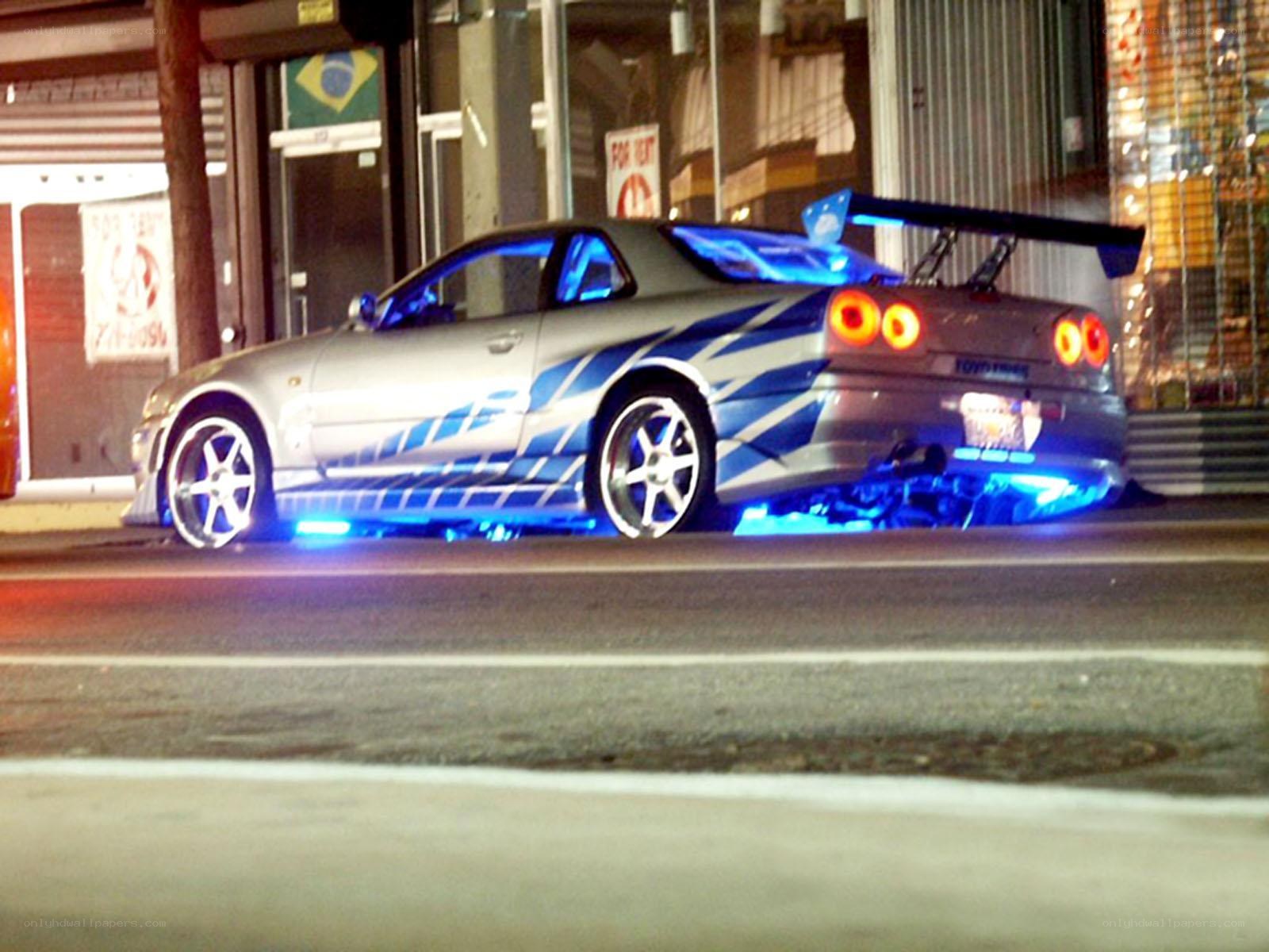 silver car with blue lights