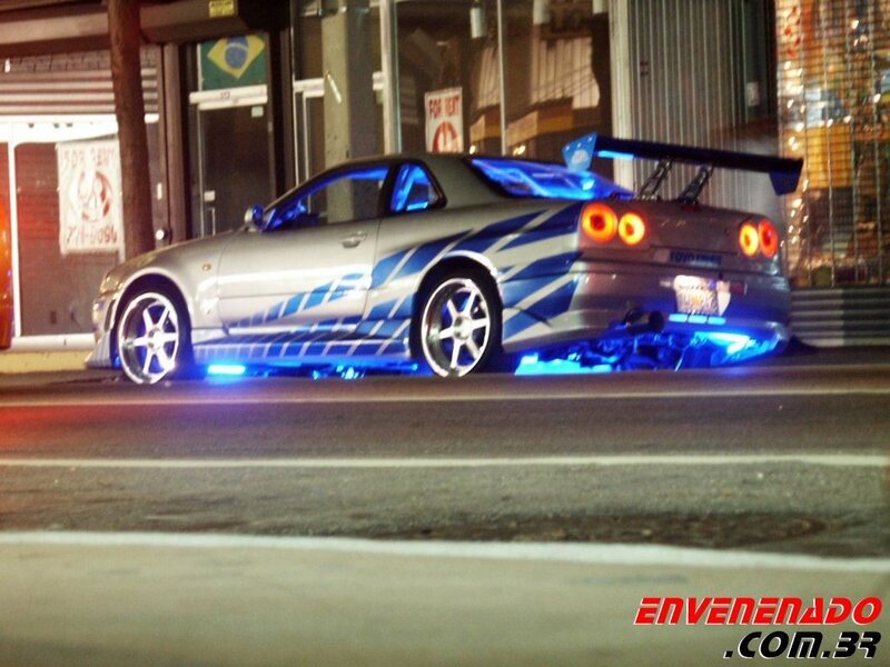 silver car with blue lights