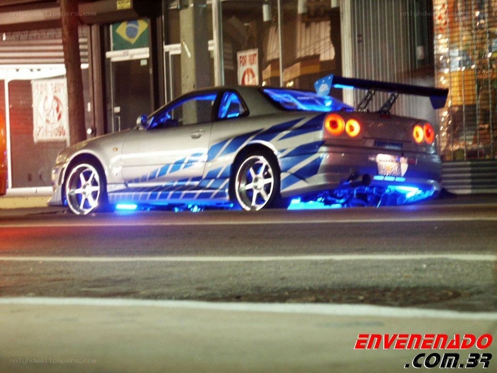 silver car with blue lights