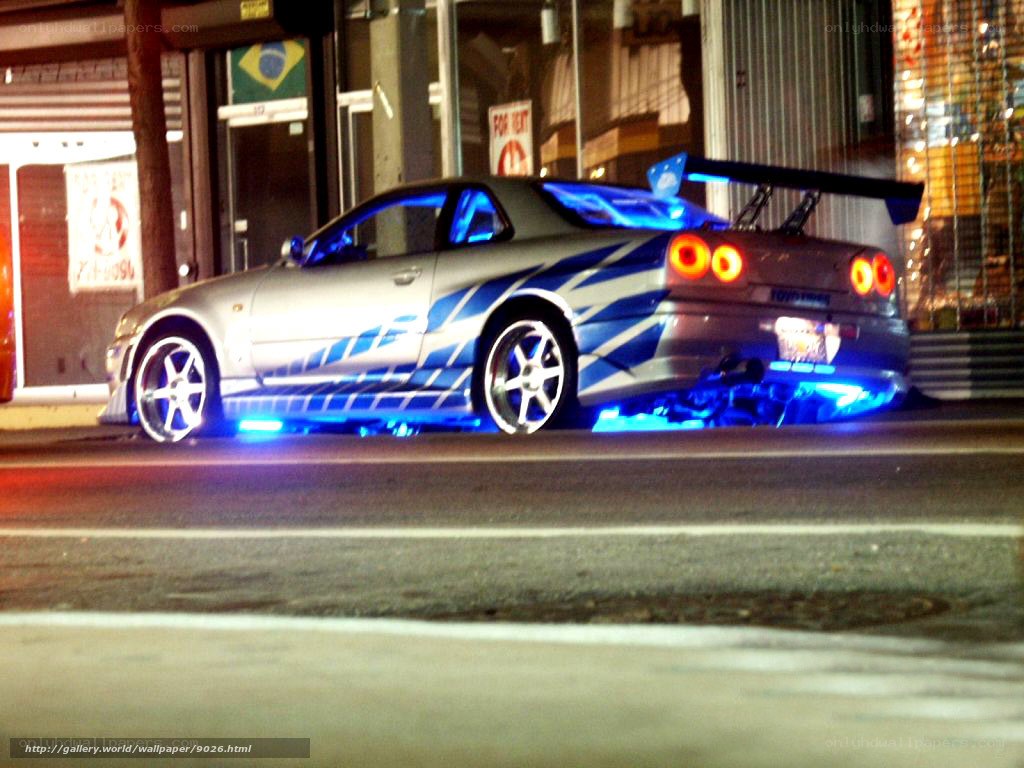 silver car with blue lights