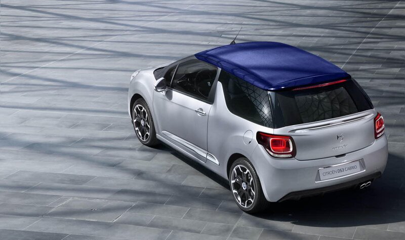 Silver Car with Blue Roof — Dramatic