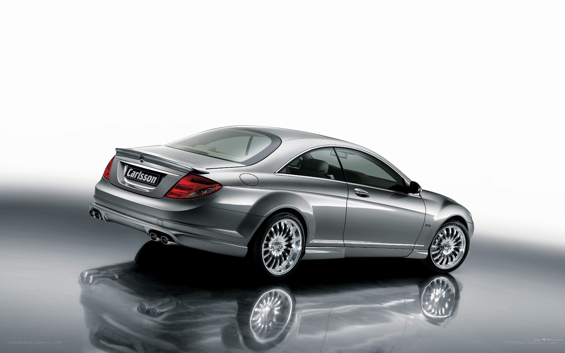 silver car with Carlsson badge