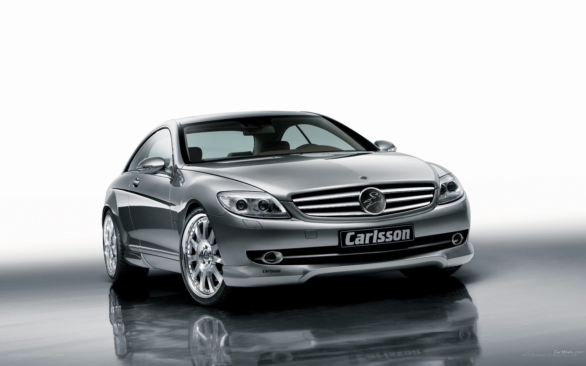 silver car with Carlsson badge