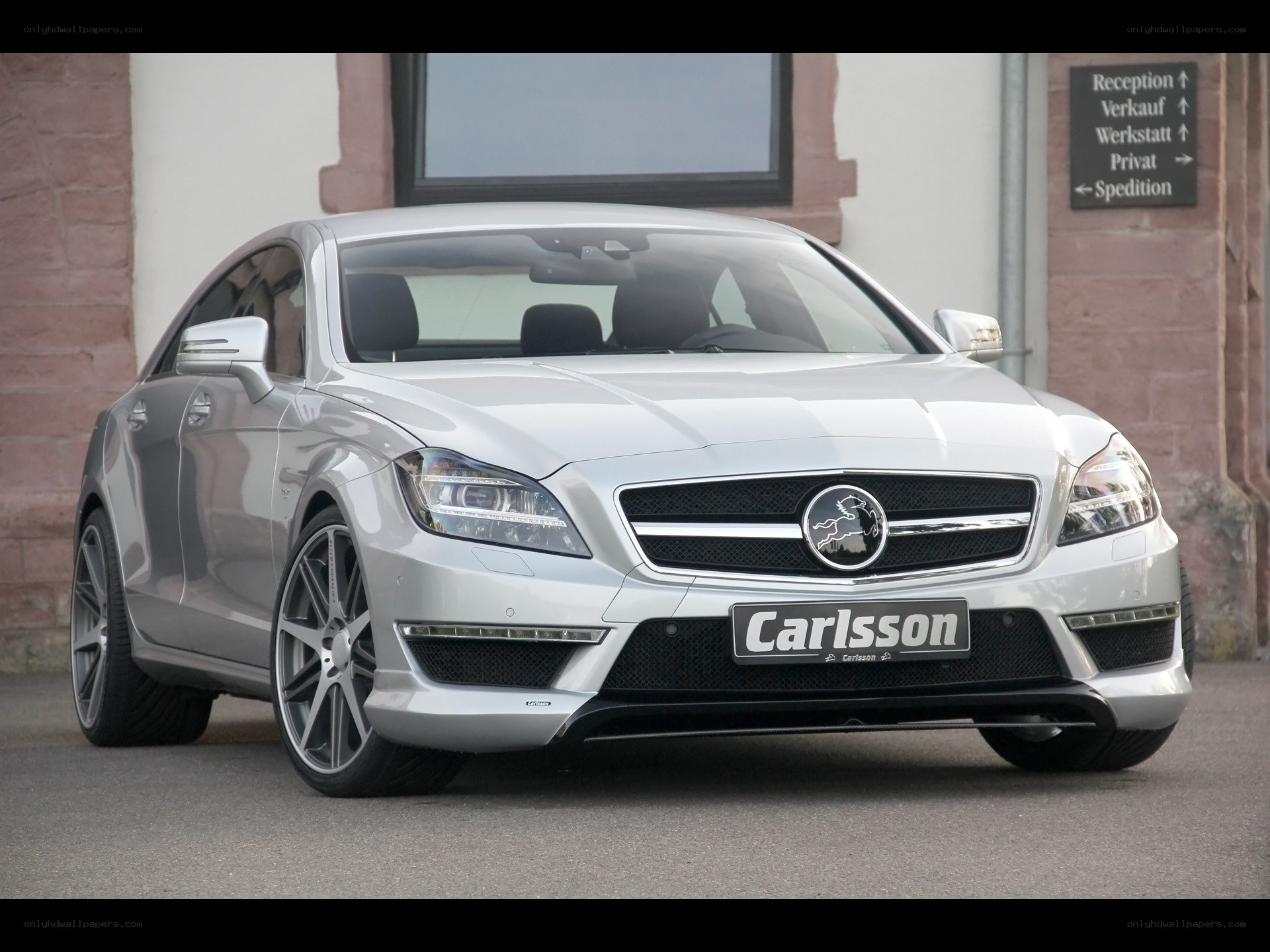 silver car with custom front bumper