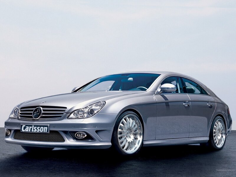 silver car with custom wheels