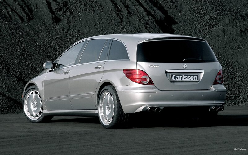silver car with custom wheels
