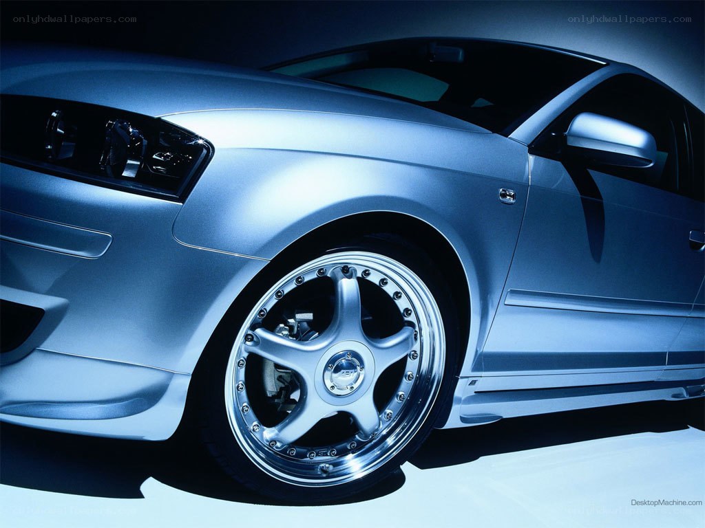 silver car with custom wheels