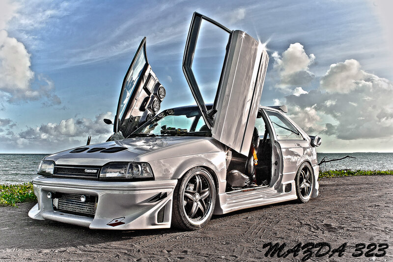 Silver Car with Doors Open — Dramatic