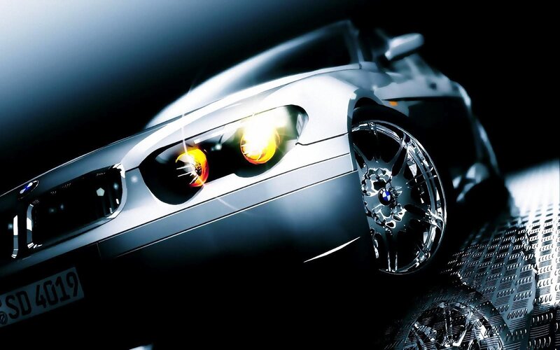 silver car with glowing headlights