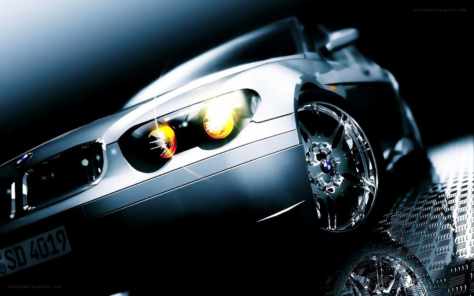 silver car with glowing headlights