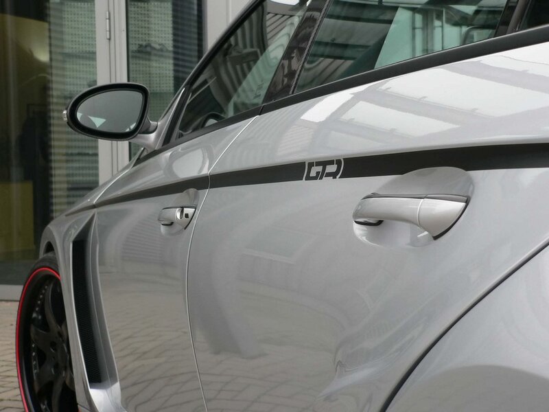 silver car with GR decal