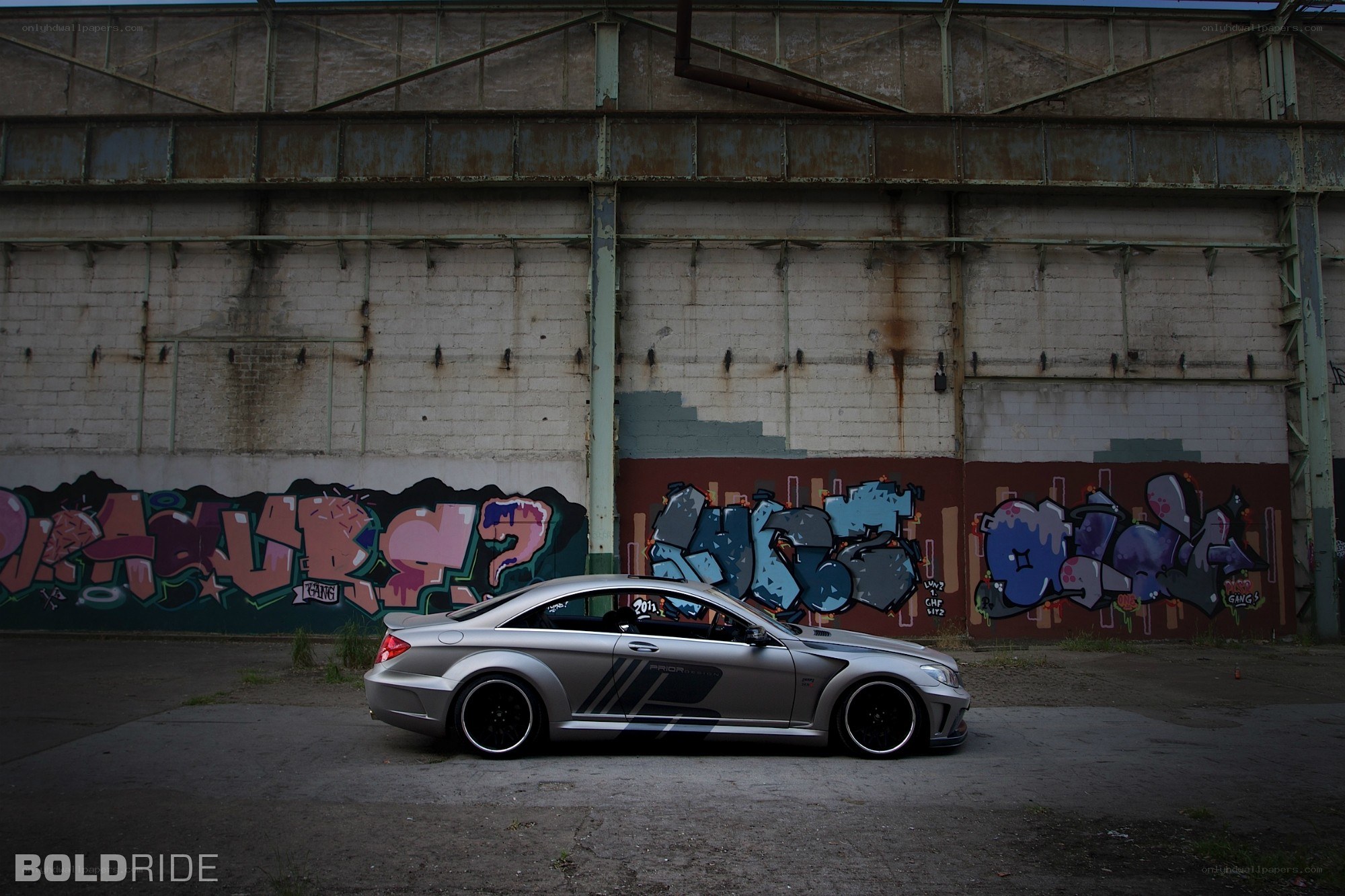 Silver car with graffiti art