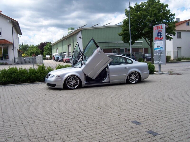 Silver car with gullwing doors