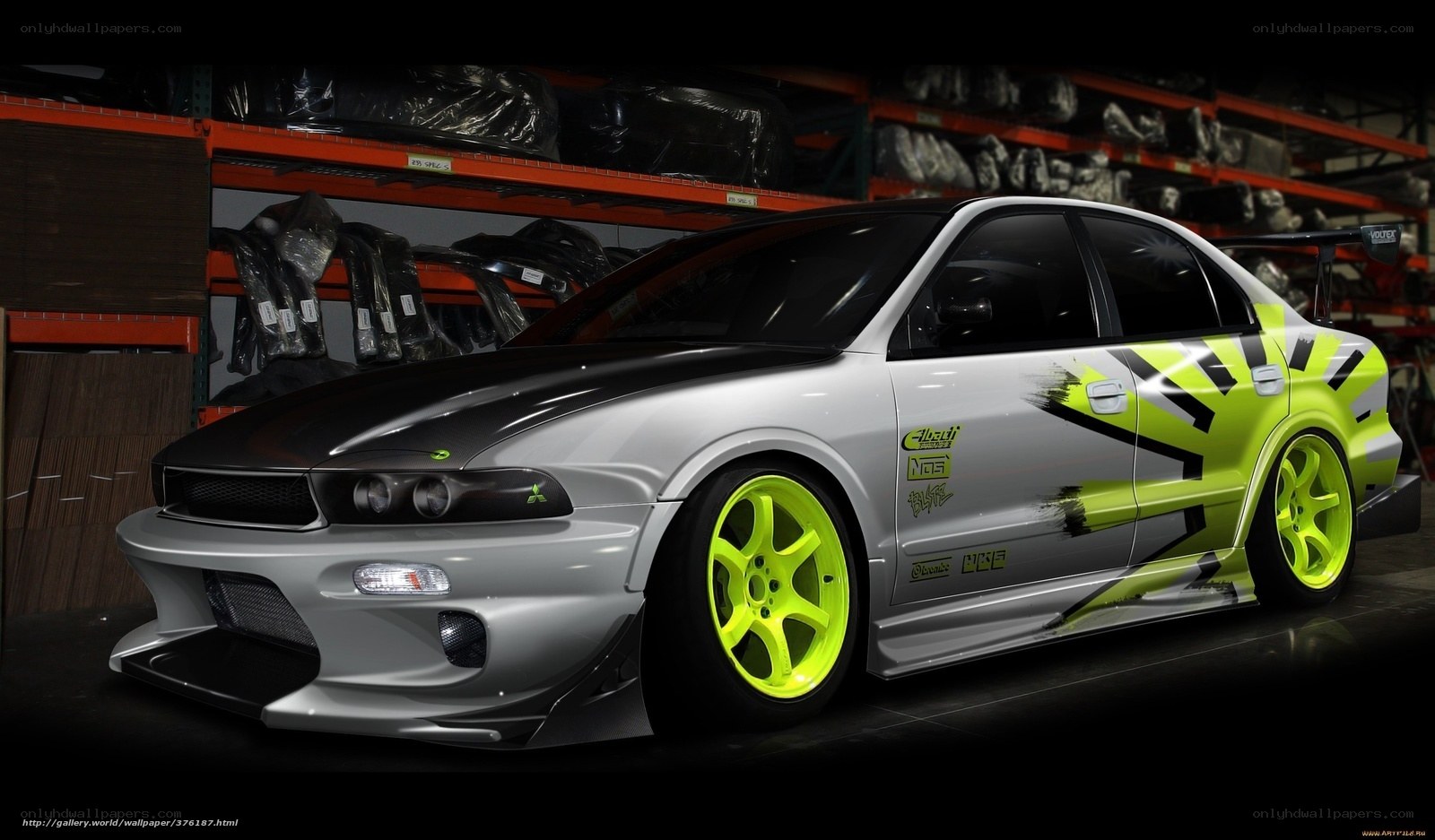 silver car with neon green wheels