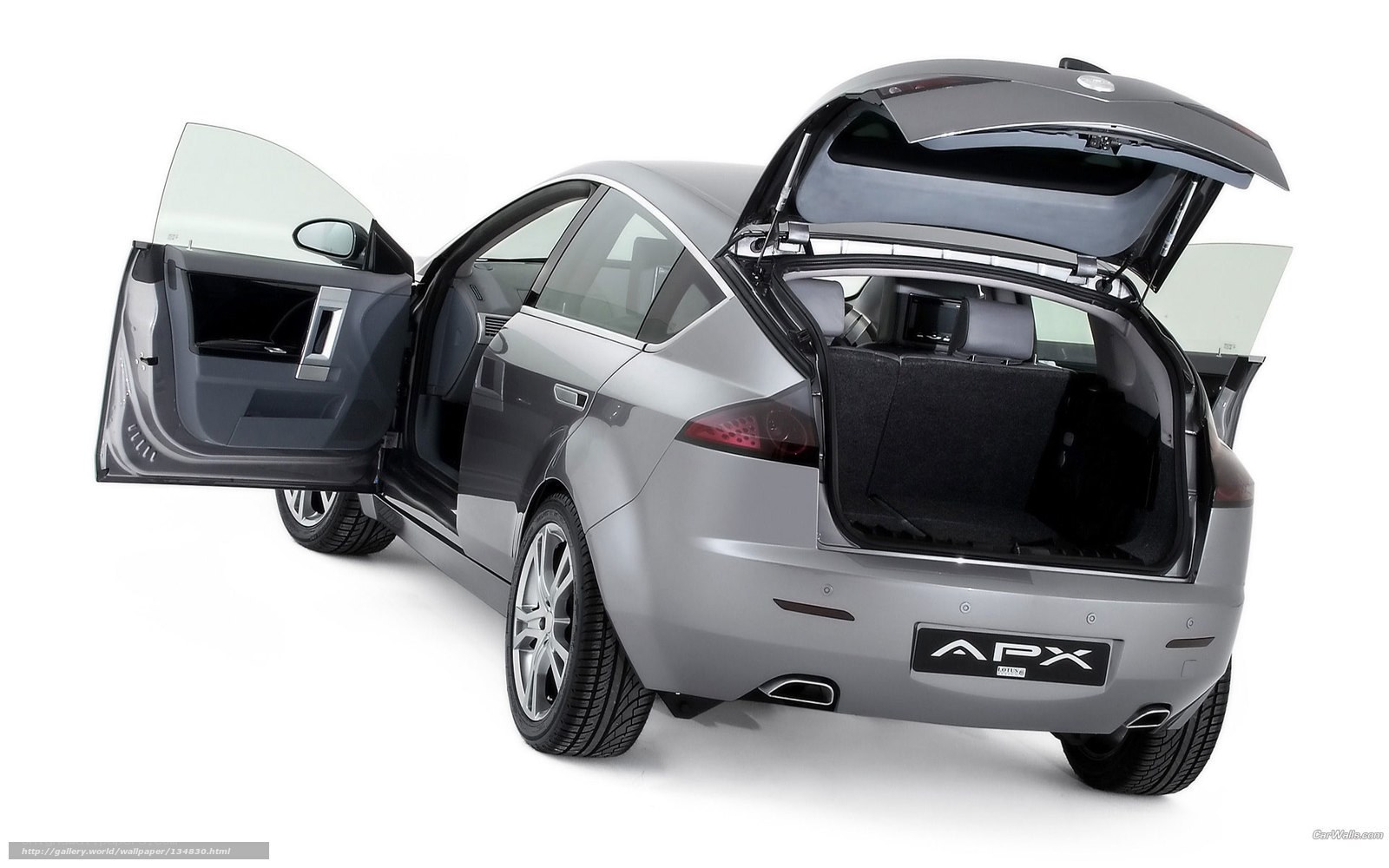silver car with open doors and trunk