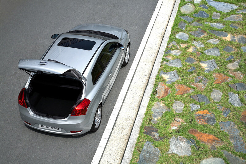 Silver car with open trunk
