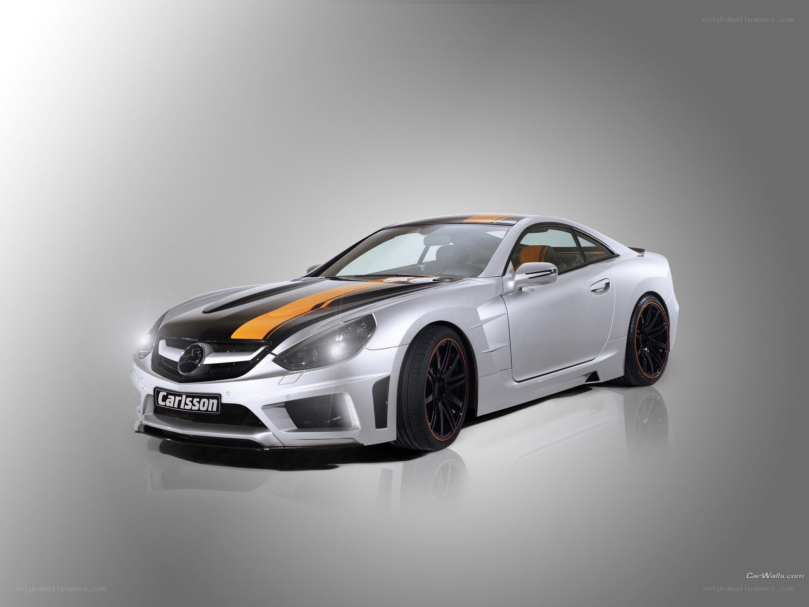 silver car with orange stripes