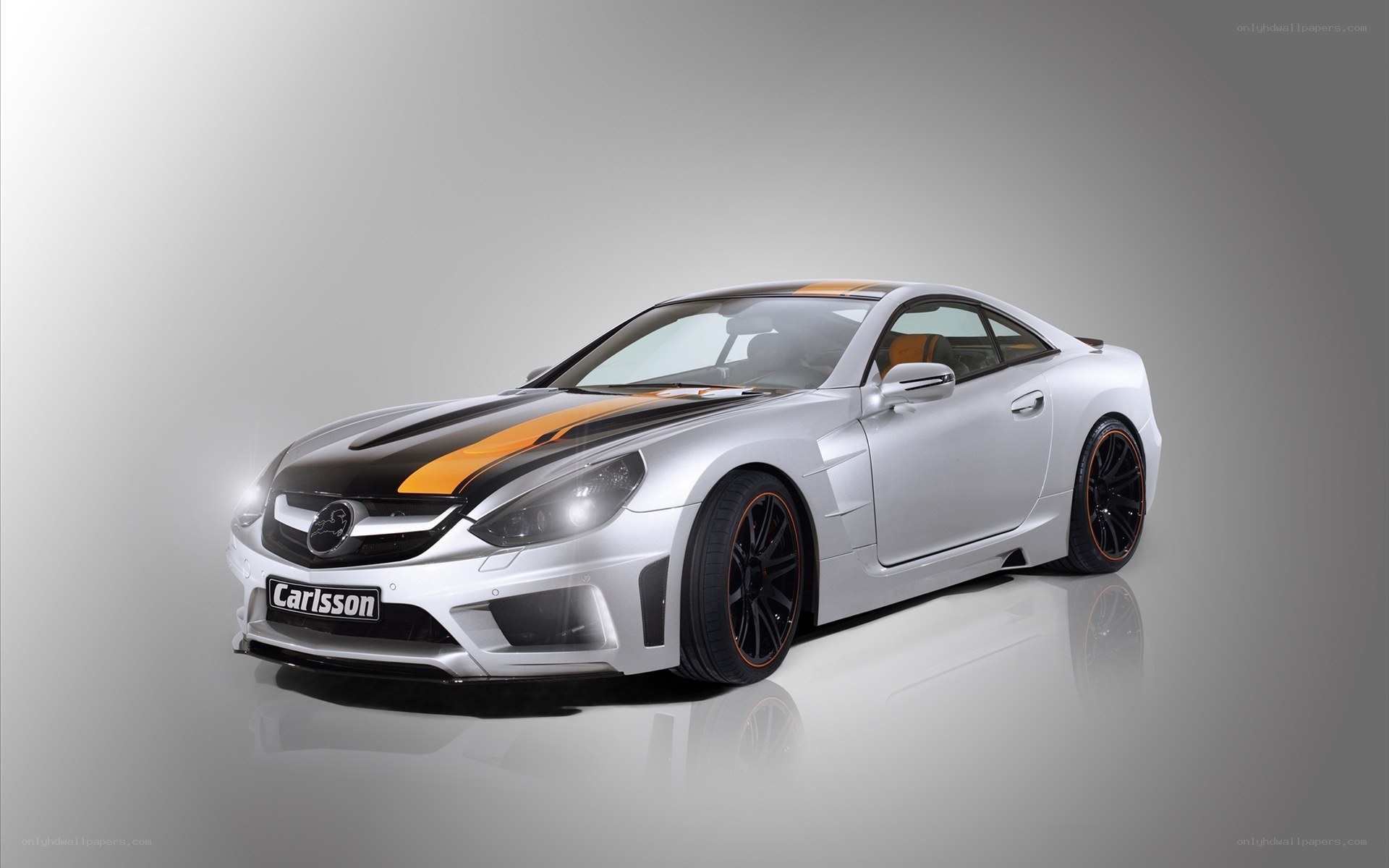 silver car with orange stripes