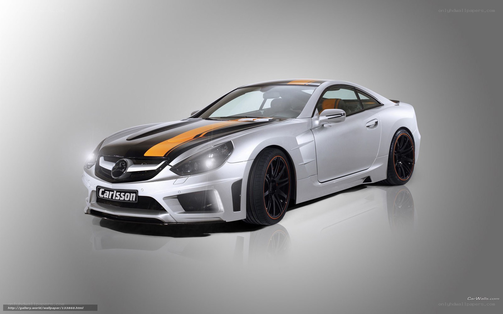 silver car with orange stripes
