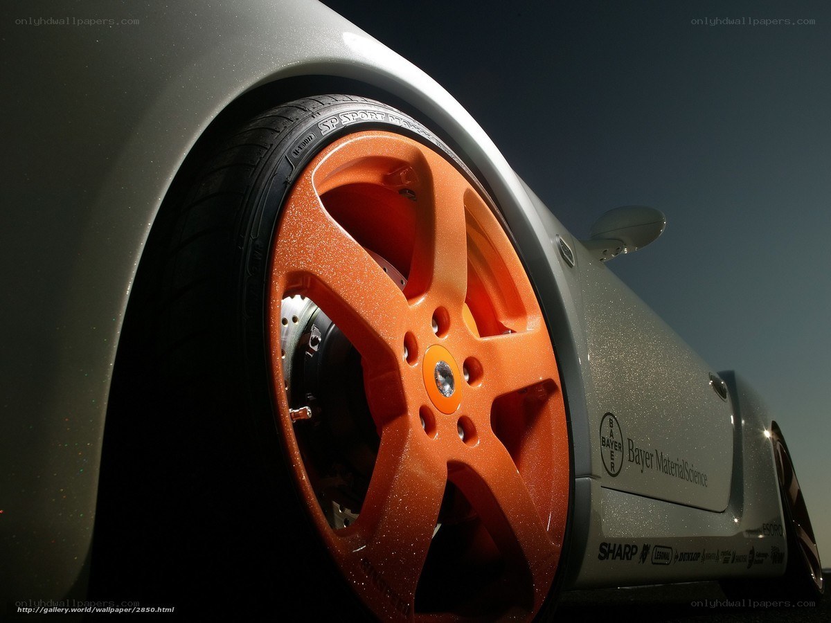 silver car with orange wheels